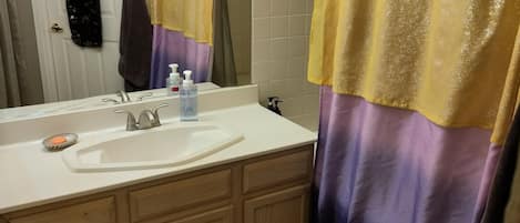 Hair dryer, towels, soap, shampoo