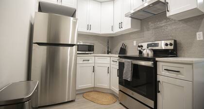 A Gem in the Heart of Queens: 2 Bed + 2 Bath with Large Backyard