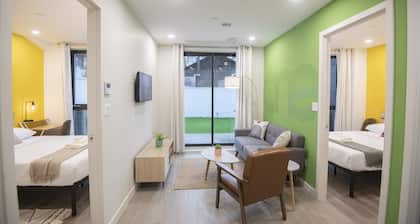 A Gem in the Heart of Queens: 2 Bed + 2 Bath with Large Backyard