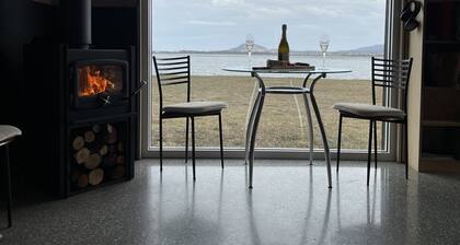 The Studio - Seclusion by the water with your own private beach.