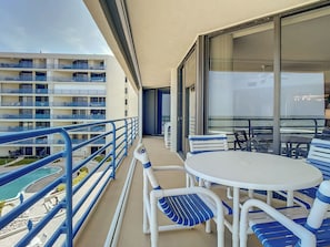 Outdoor dining - Totally Renovated Luxury Ebb Tide Condo ~ Beachfront with Pool Views! Ebb Tide 406 (New Smyrna Beach)