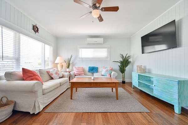 Family room wth smart TV and pull out sofa bed.