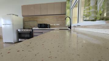 Deluxe Apartment | Private kitchen | Coffee/tea maker