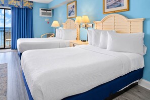 A hotel room with two beds, a view of the sea, and a balcony. - Seaside Retreat | Sea Mist Twenty-Nine Oh Nine (Myrtle Beach)