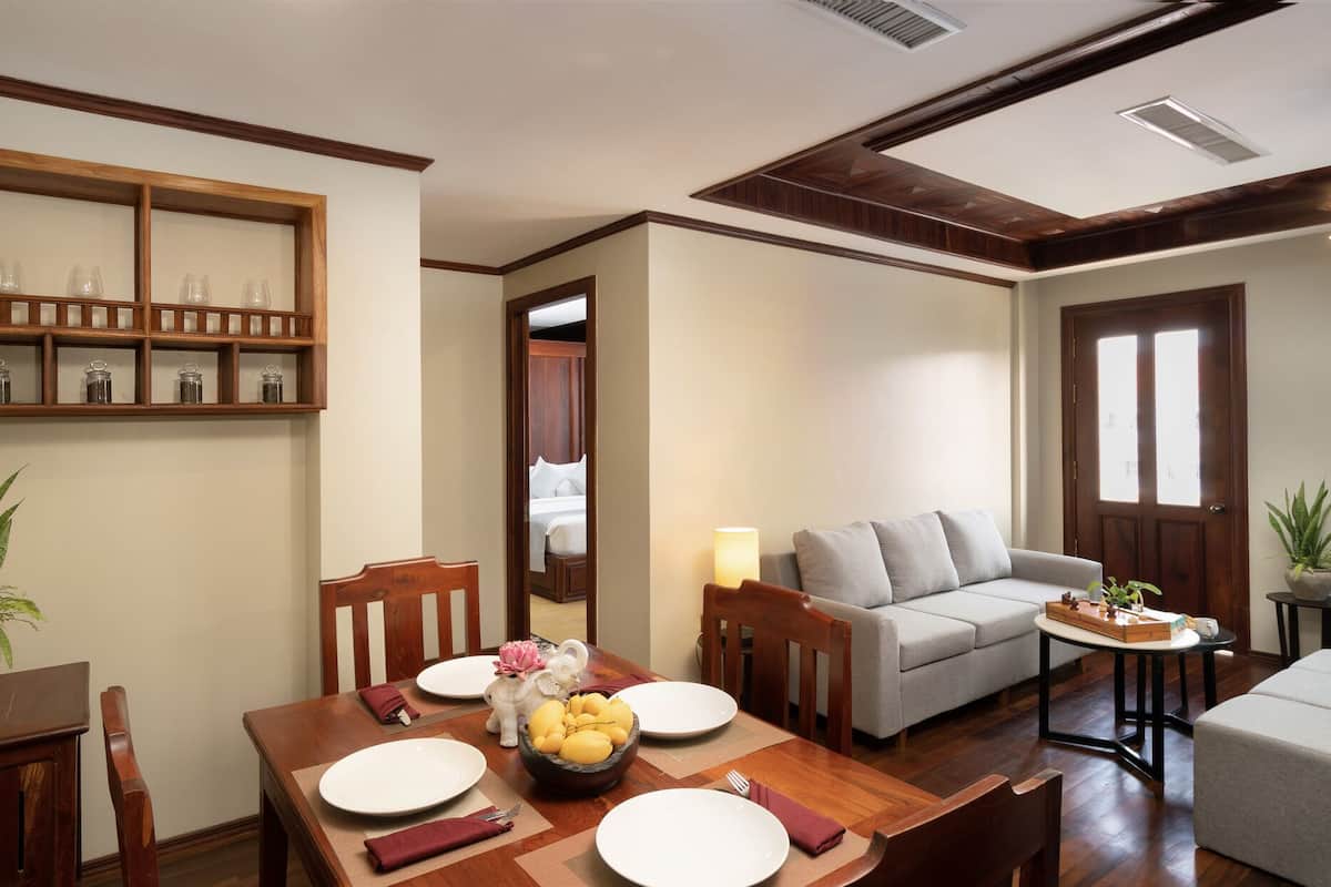 Two-Bedroom Suite with Private Kitchen | Private kitchen | Coffee/tea maker, highchair, dining table