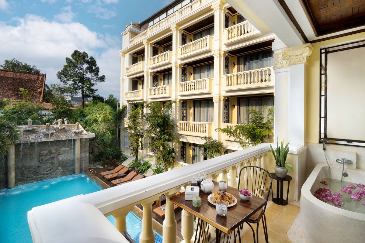 Honeymoon Suite with Balcony & Pool View | Premium bedding, down comforters, pillowtop beds, minibar