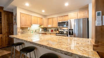 Condo, 2 Bedrooms | Private kitchen | Coffee/tea maker