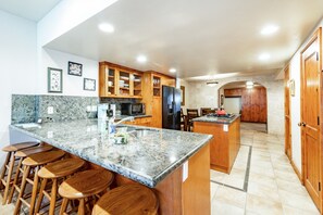 Condo, 5 Bedrooms | Private kitchen | Coffee/tea maker