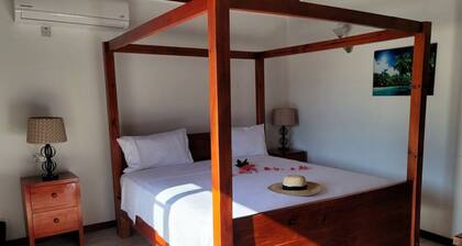 Cozy Oceanview Room at Hidden Treasure Villas