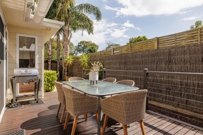 Outdoor deck area outdoor seating and BBQ