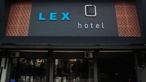 A hotel sign with the name "LEX hotel" and a geometric pattern on the sides. - LEX HOTEL BANJARMASIN BY EXCELSIOR (Banjarmasin)