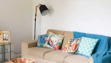 Family Apartment | Living area | 60-cm flat-screen TV with digital channels, TV