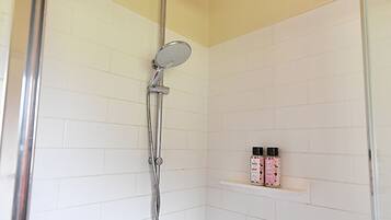 Shower, hair dryer, bathrobes, towels