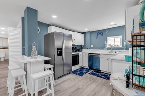Fridge, microwave, dishwasher, coffee/tea maker