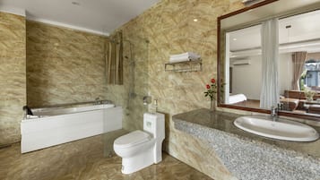 Luxury Double Room | Bathroom | Rainfall showerhead, hair dryer, slippers, bidet