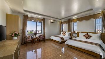 Deluxe Room, 2 Queen Beds | Minibar, in-room safe, desk, blackout curtains