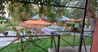 Riverside Splash- Stylish and Cozy Cottages by the River bank