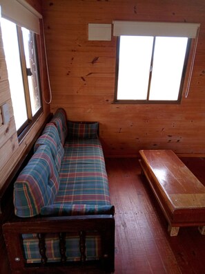 Family Cabin | Living area | 32-inch LED TV with cable channels, TV - Complejo Turístico Los Piamonteses  (Colonia Cosmopolita)