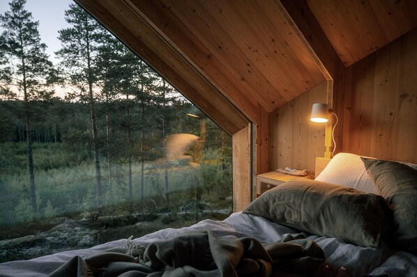 Ylelliset vuodevaatteet, pillowtop-patjalliset sängyt, minibaari