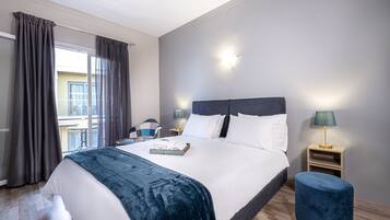 Standard Double or Twin Room, Partial Sea View | Minibar, in-room safe, desk, laptop workspace