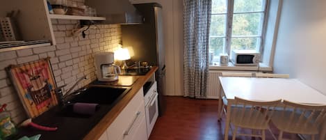 Apartment | Private kitchen | Fridge, microwave, oven, stovetop
