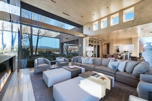 Smart TV, fireplace, books, offices