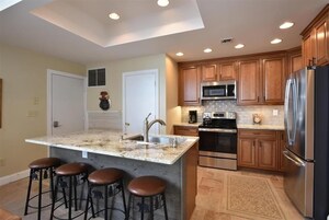 Townhome, 3 Bedrooms | Private kitchen | Fridge, oven, coffee/tea maker, toaster