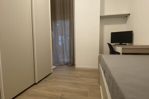 2 dormitorios, tabla de planchar con plancha, cuna de viaje y wifi