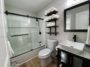 Combined shower/tub