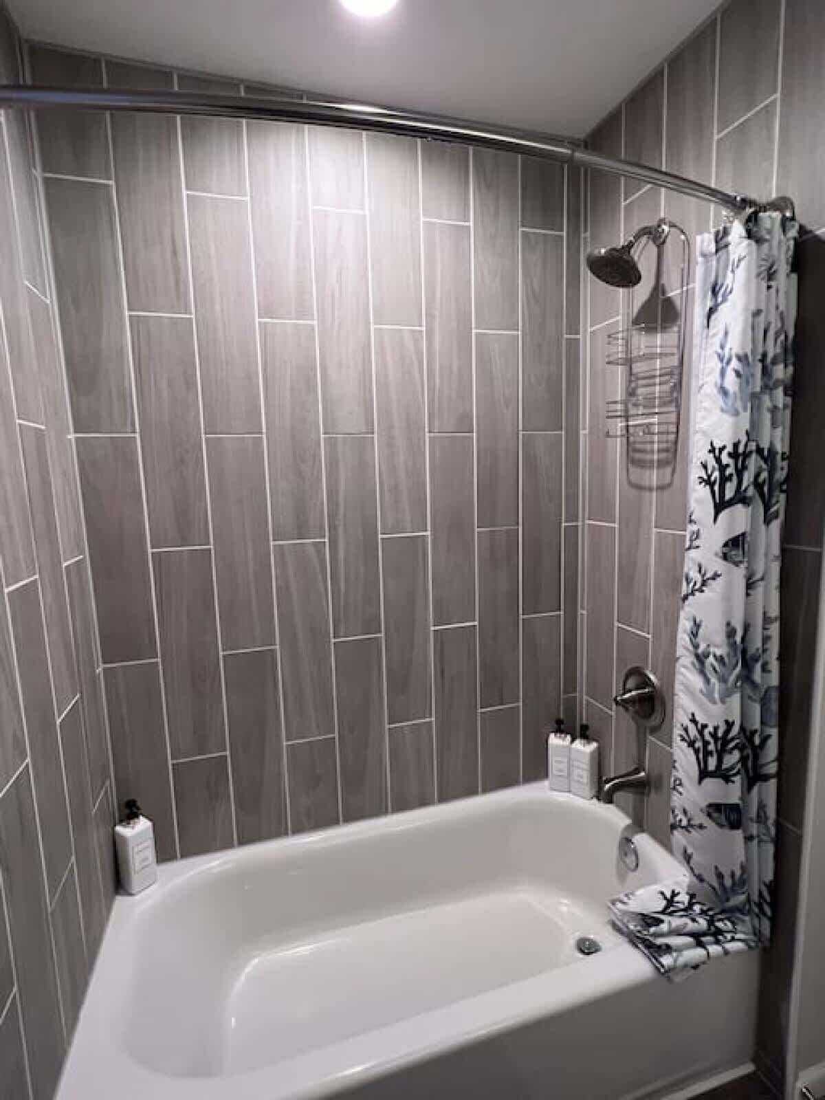 Shower, hair dryer, towels, shampoo