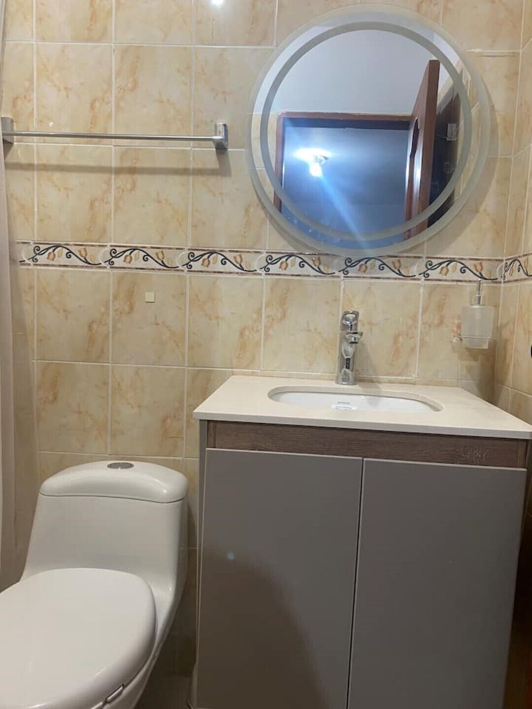 Shower, towels, soap, toilet paper