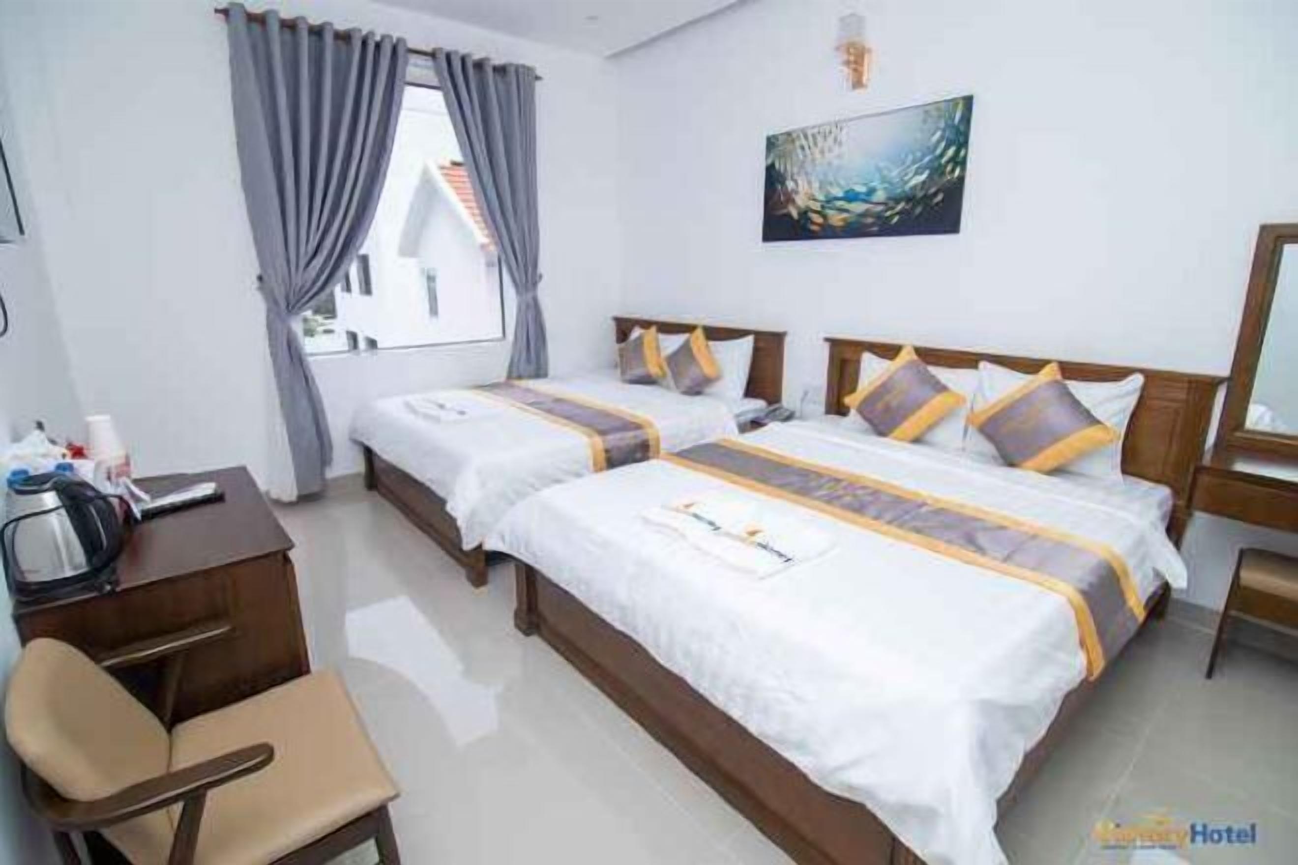 Hypo-allergenic bedding, down duvets, minibar, desk
