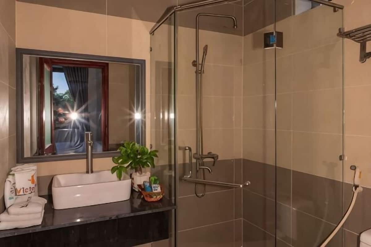 Shower, hydromassage showerhead, designer toiletries, hair dryer