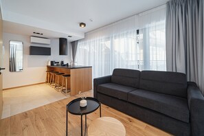 Comfort Apartment, 1 Bedroom, Balcony, Pool View | Living room - Lipowy Dwór (Zakopane)