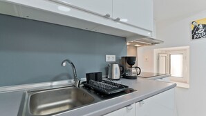 Kaffetrakter/tekoker, kjøleskap, mikrobølgeovn og vannkoker