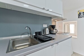Fridge, microwave, coffee/tea maker, electric kettle