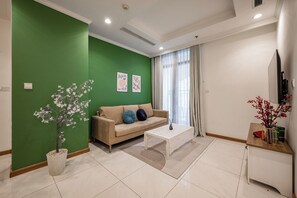 Family Apartment | Desk, blackout drapes, soundproofing, iron/ironing board - An Corner Vinhomes Central Park (Ho Chi Minh City)