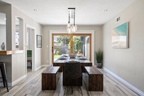 Enjoy meals in this stylish dining area with a large table and comfortable seating for six.