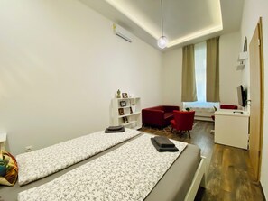 1 chambre, bureau, fer et planche à repasser, Wi-Fi gratuit