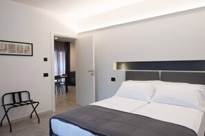 Suite júnior, 1 dormitori, cuina bàsica | Llençols italians de la marca Frette i roba de llit d'alta qualitat 