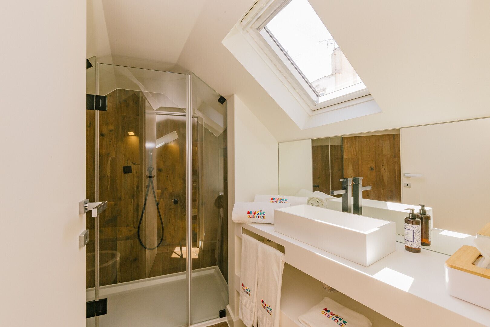 Shower, eco-friendly toiletries, hair dryer, towels