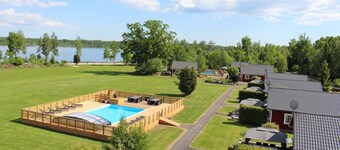 Dream location on the lake with pool, internet, sauna, fire place and boat with electric engine