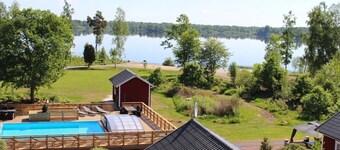 Dream location on the lake with pool, internet, sauna, fire place and boat with electric engine