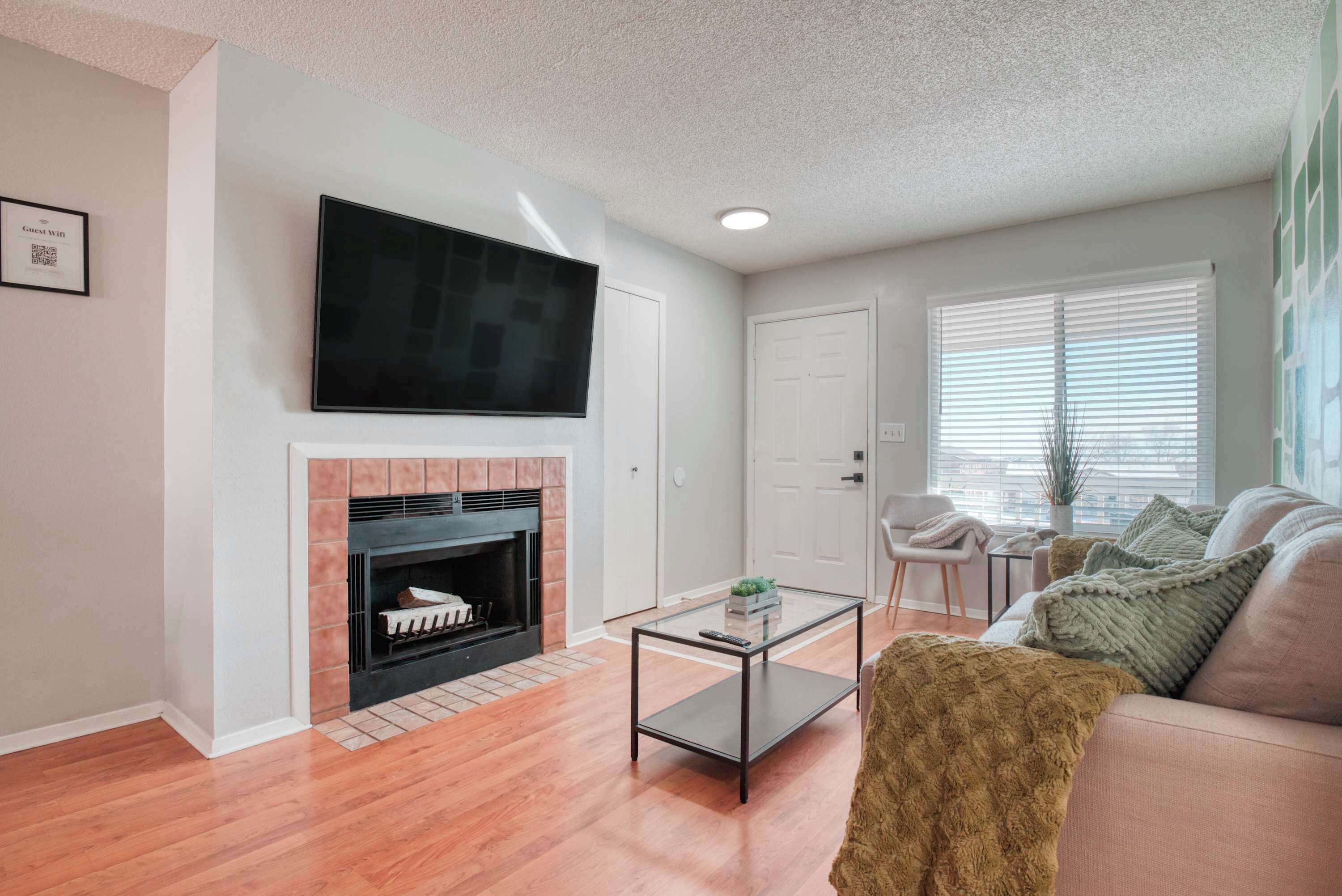 TV, fireplace, books, offices