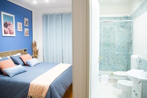 Habitación Deluxe doble | Escritorio, wifi gratis, ropa de cama