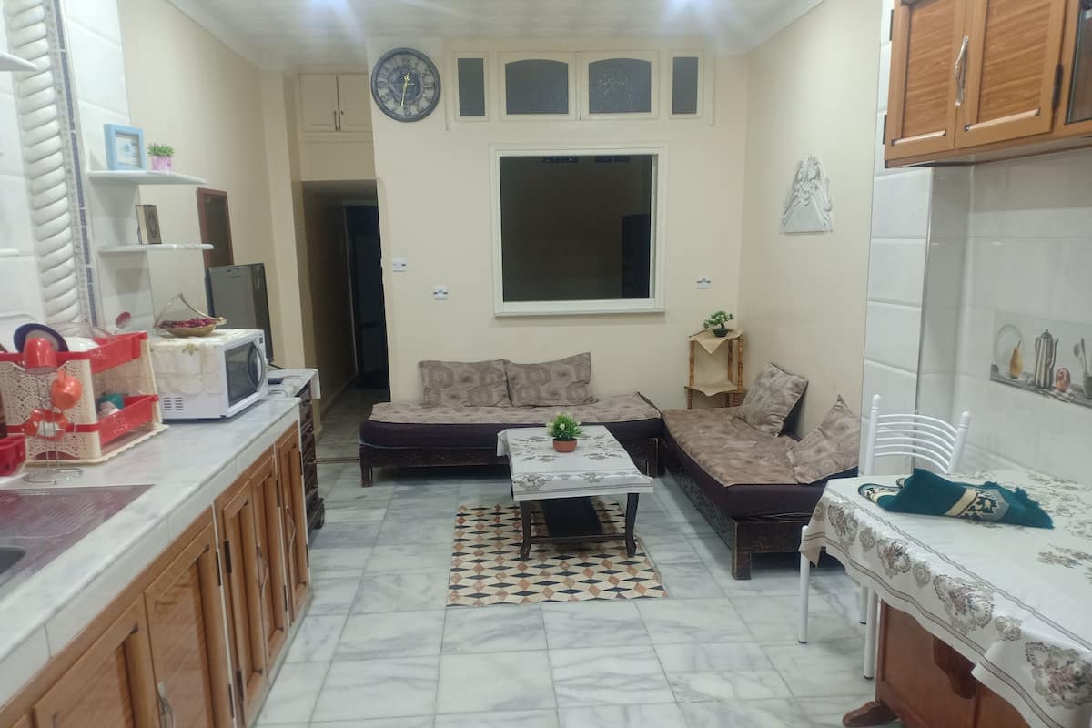 Comfort Apartment | Living room | Flat-screen TV