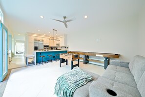 Smart TV, fireplace, foosball, books