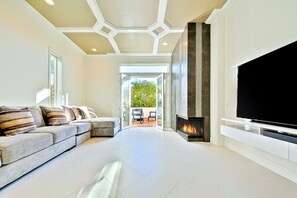 Smart TV, fireplace, foosball, books