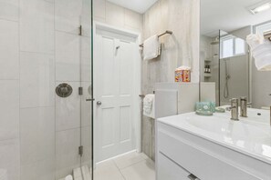 Bathtub, hair dryer, towels