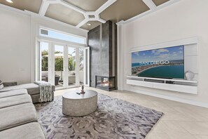 Smart TV, fireplace, table football, books